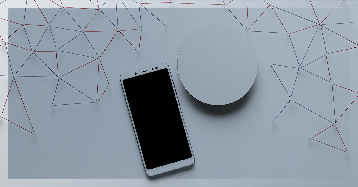 Smartphone branco sobre uma superfície clara com linhas formando uma rede minimalista ao fundo, representando conexão e minimalismo digital.